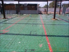 Wire mesh installed over vapor barrier