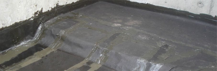 PRECON sheeting was applied before concrete was poured to protect the basement floors from underground seepage.